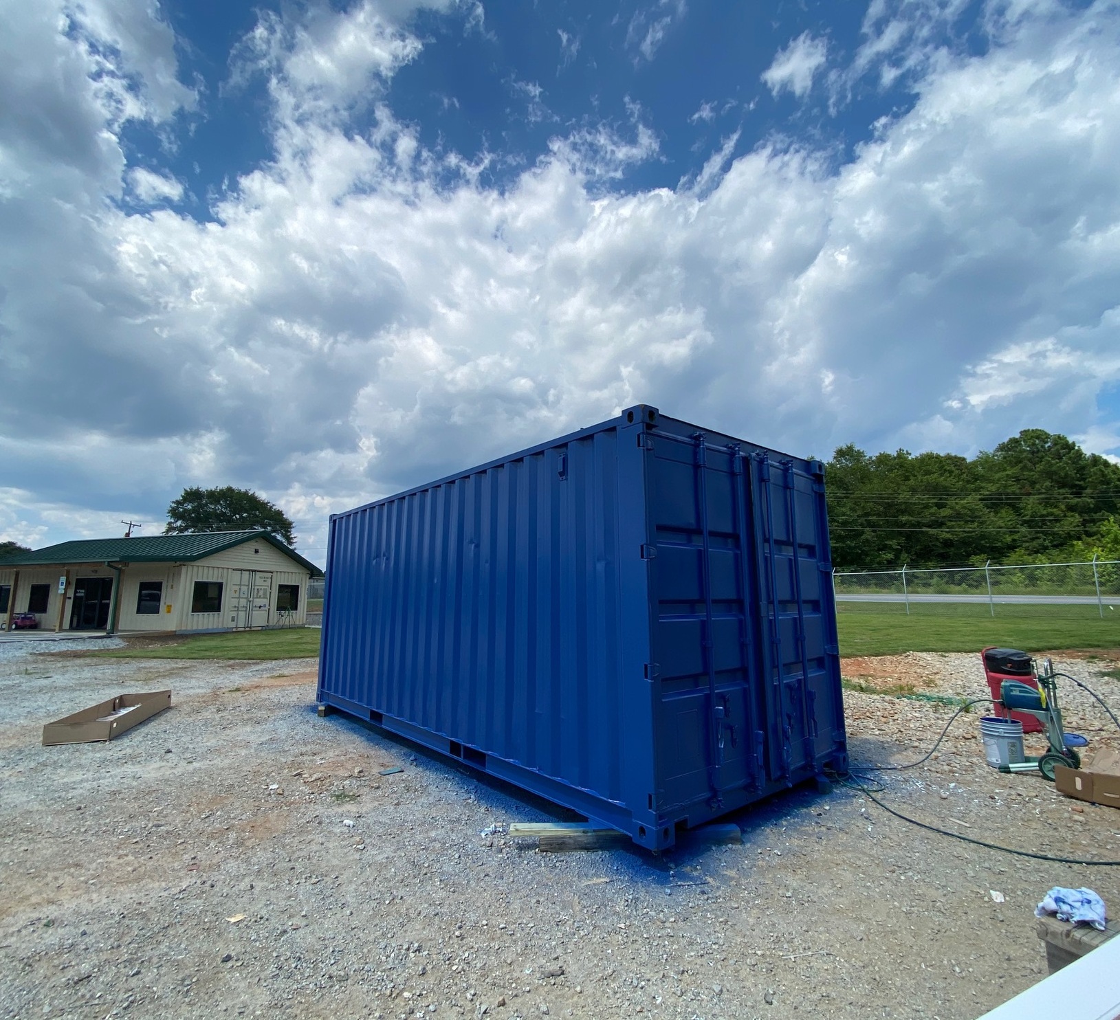 Blue storage container with client branding